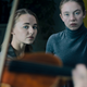 Vivian (Madison Iseman) practices while Juliet (Sydney Sweeney) turns the pages and dies inside in Nocturne.